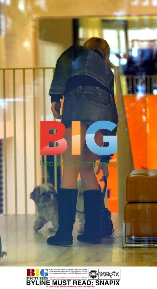Geri Halliwell Out Shopping with Dog in West London