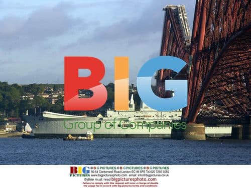 Aircraft Carrier 'Illustrious' Passes Under Bridges