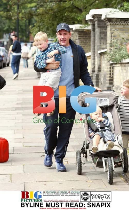 Dale Winton out with his godchildren