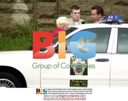 Police search pickup truck in sniper case