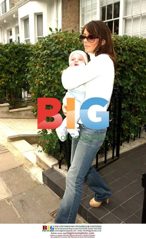 Liz Hurley and baby Damien leave home