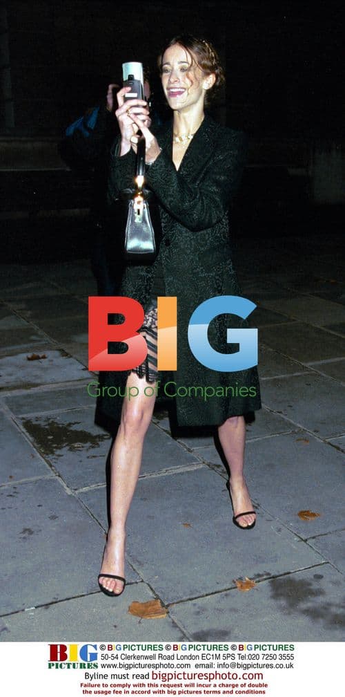 Leah Wood Departs Versace Exhibit