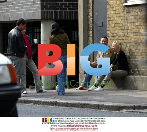 TV presenter Toby Anstis plays football with friends