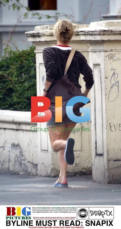Model Laura Bailey rushes in North London