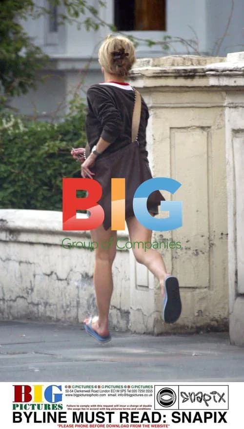 Model Laura Bailey Rushing Down Street