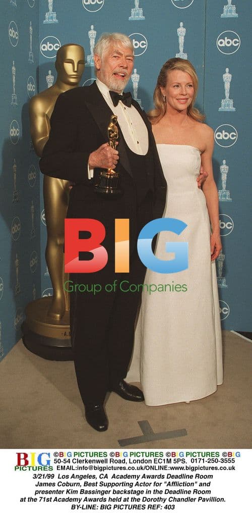 James Coburn and Kim Bassinger at Oscars