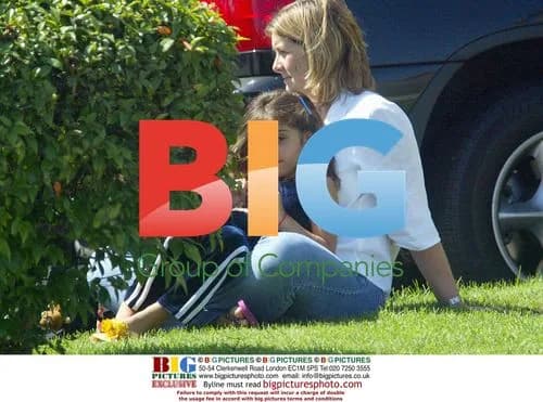 Madonna's daughter Lourdes playing with puppy