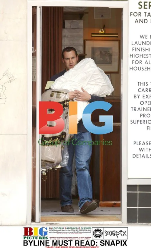 Comedian Johnny Vaughan Doing Laundry