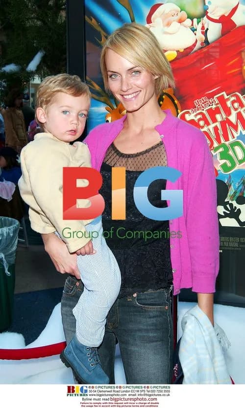 Amber Valetta & son at 'Santa vs the Snowman' premiere