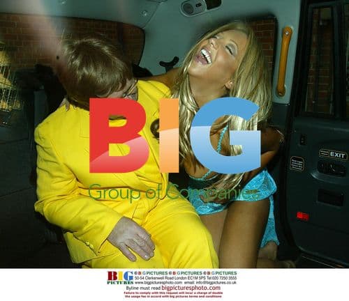 Emma Jones and Elton John lookalike in taxi