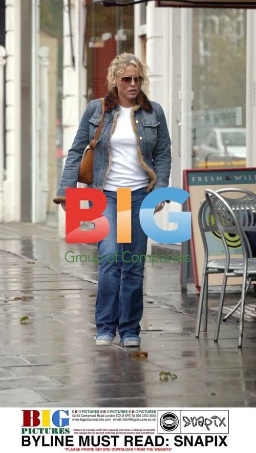 Patsy Kensit out in rainy West London