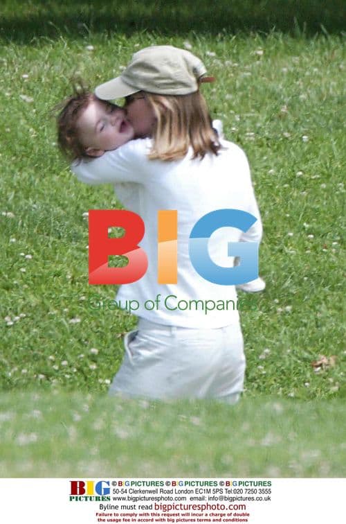 Calista Flockhart with son Liam and personal trainer