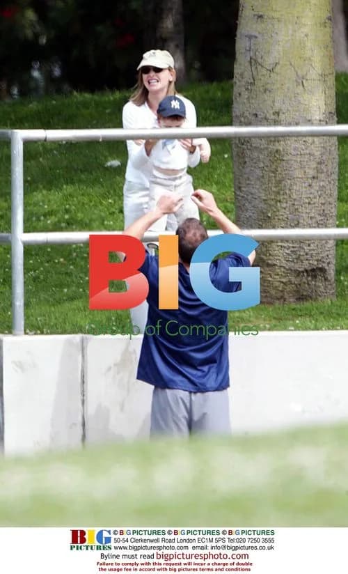 Calista Flockhart with son Liam and trainer in LA park
