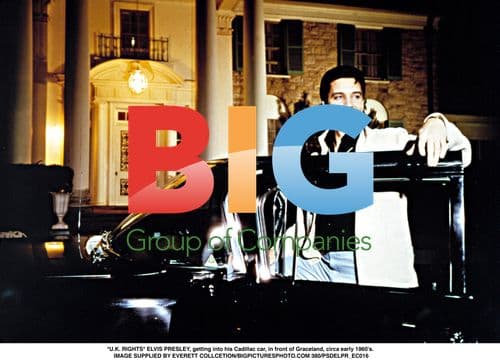 Elvis Presley with Cadillac at Graceland