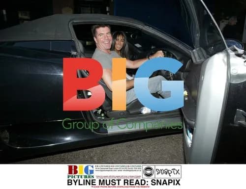Simon Cowell and Jacki St. Claire in London