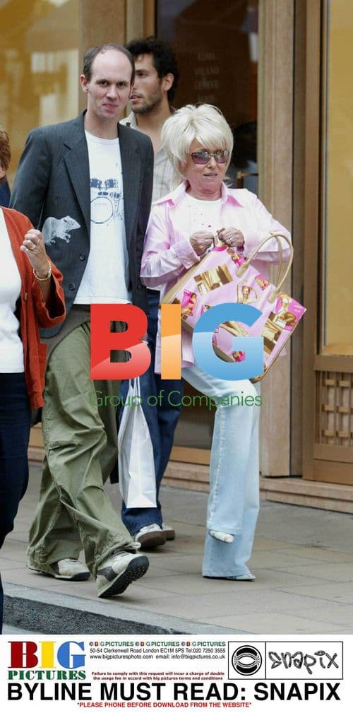 Barbara Windsor Shops for Shoes