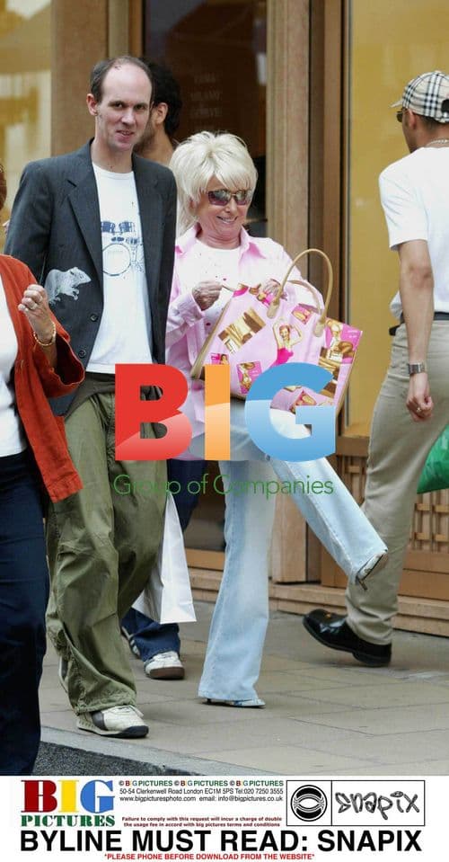 Barbara Windsor Shops for Shoes in London