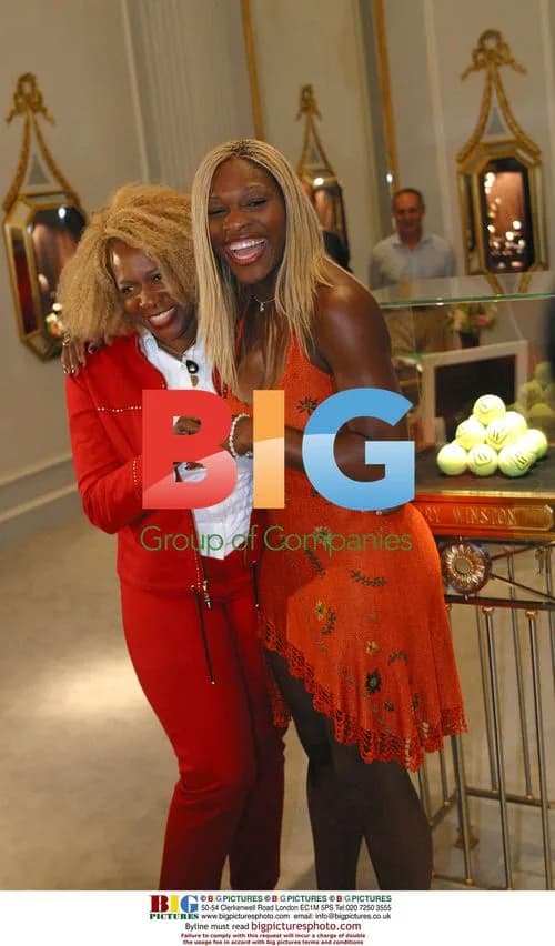 Serena Williams laughs with mother