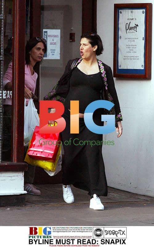 Sharleen Spitery of Texas walks in Notting Hill