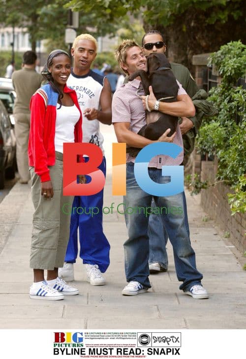 Shaznay Lewis and fiancee Christian with puppy