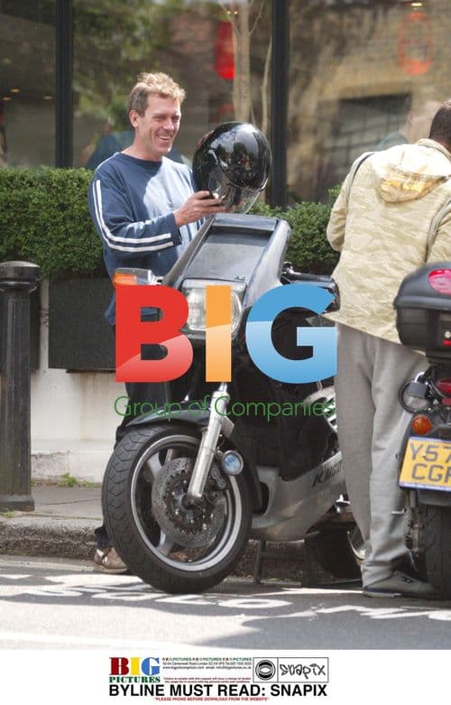 TV Comic Actor Hugh Laurie Riding Motorcycle