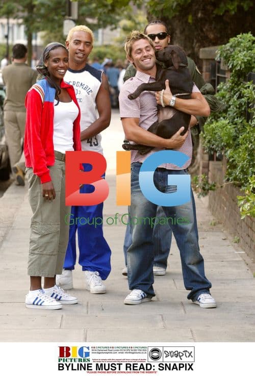 Shaznay Lewis and Fiancee Christian with Puppy