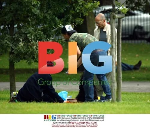 Gwen Stefani Plays with Dog in London Park