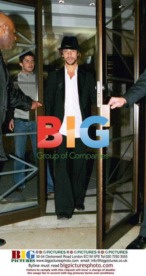 Actors on red carpet at film premiere