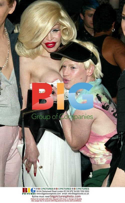 Amanda LaPore and Richie Rich at Heatherette party