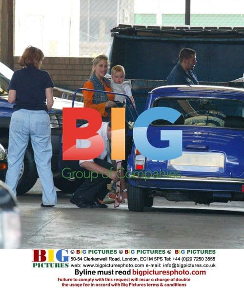 Nicole Appleton and family visit car showroom