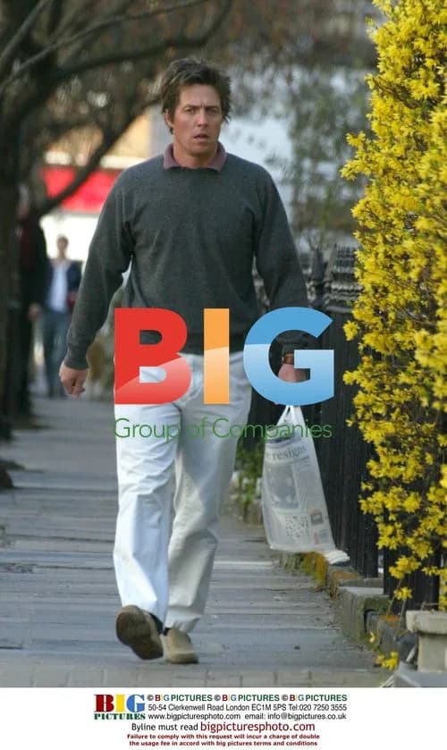 Hugh Grant Collects Morning Papers