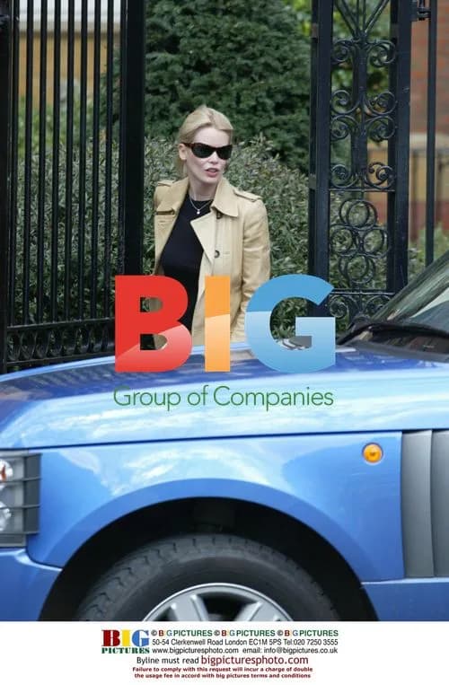 Claudia Schiffer visits bank with husband
