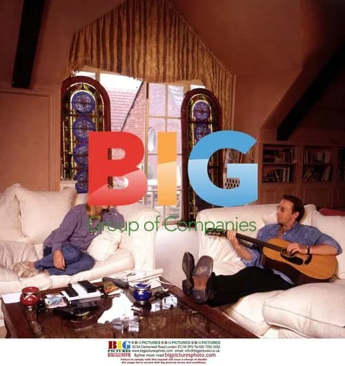 Cynthia and Julian Lennon Pose at Home