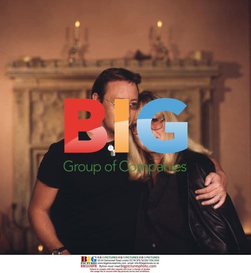 Cynthia and Julian Lennon Pose at Home