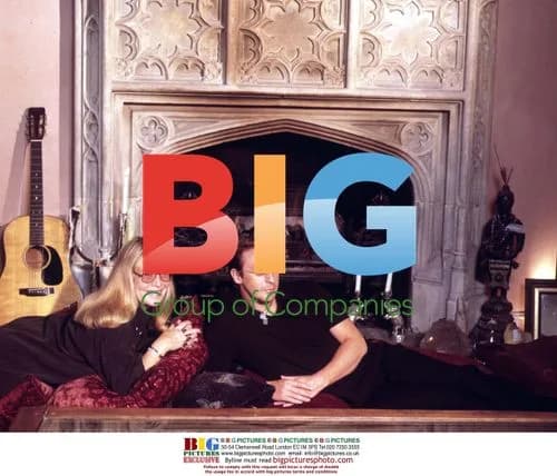 Cynthia and Julian Lennon Pose at Home