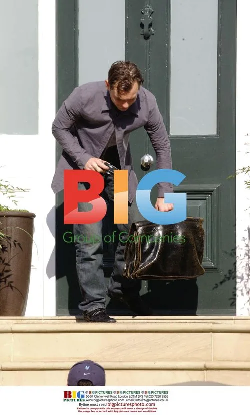 Jude Law Leaving Home With Camera