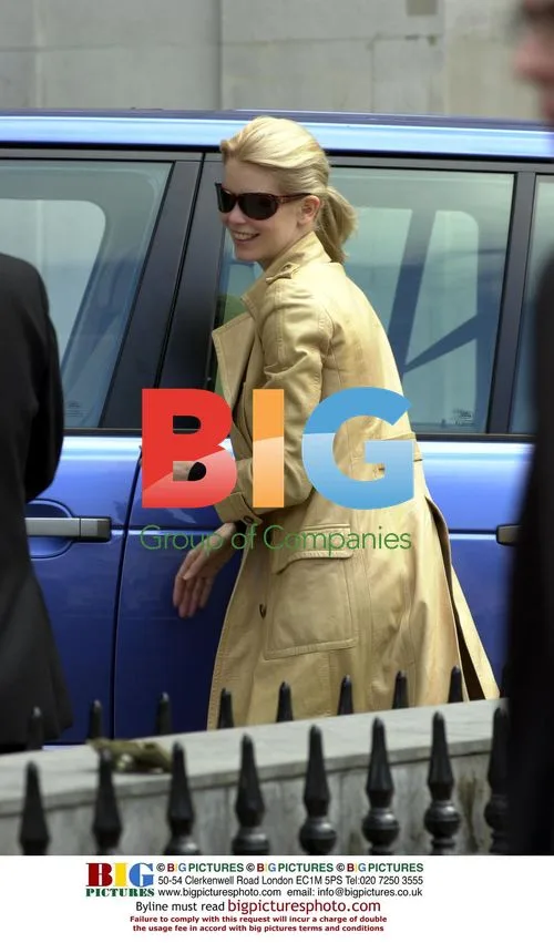 Claudia Schiffer Visits Bank in London