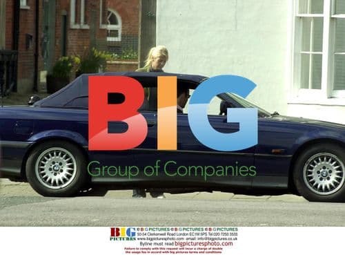 Ulrika Jonsson with boyfriend in village