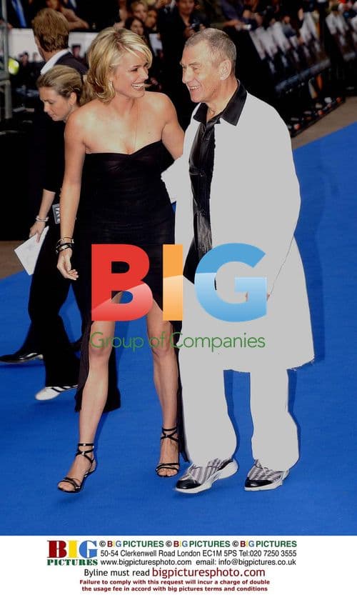 Rebecca Romijn Stamos and Sir Ian McKellen at X-Men 2 Premiere