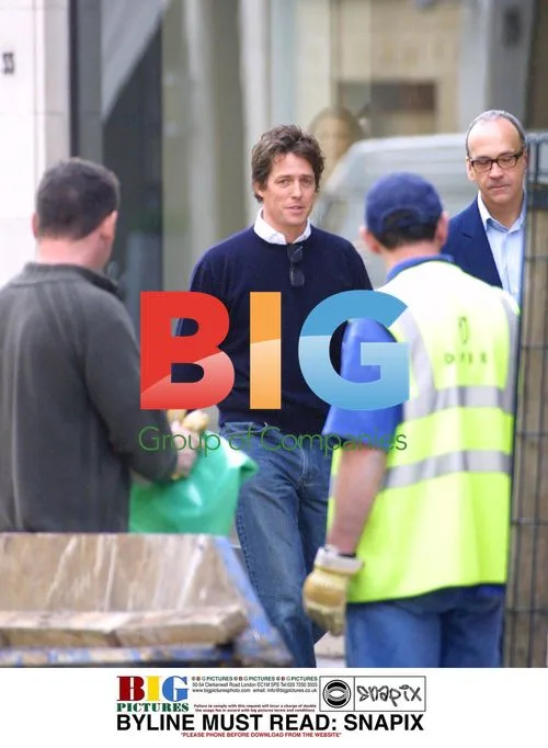 Hugh Grant and Friend Converse in Central London