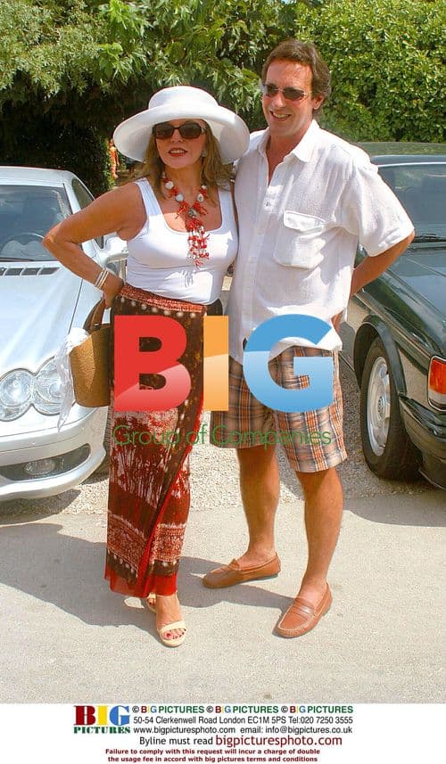 Joan Collins and Percy Gibson vacation in South of France