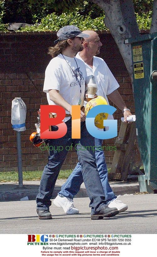 Tom Cruise changes into construction outfit