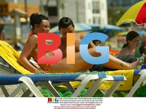 Michelle Heaton Relaxing with Boyfriend on Beach