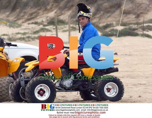 Robbie Williams on quad bike with friends