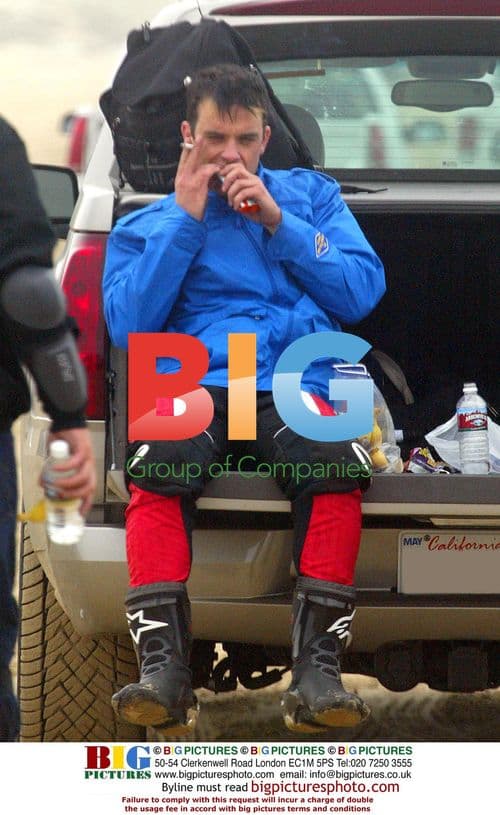 Robbie Williams Riding Quad Bike