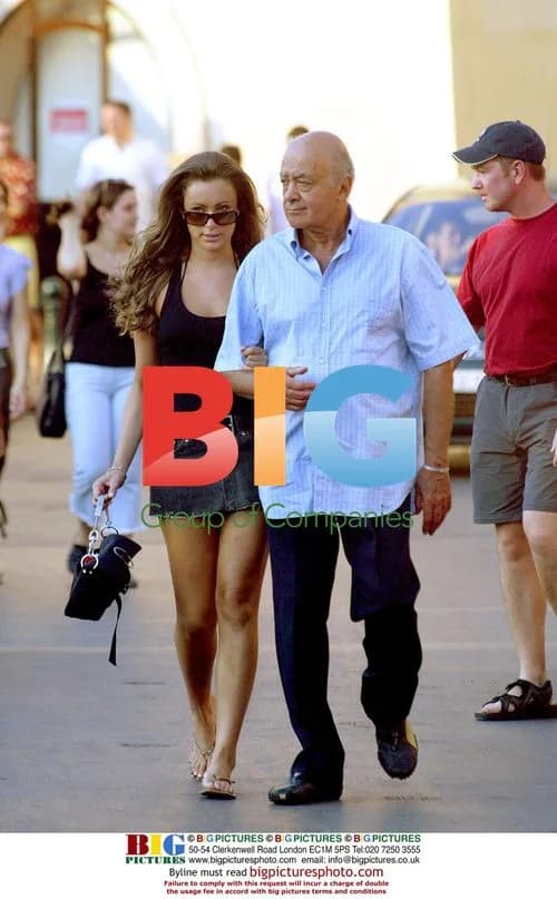 Mohamed Al Fayed with mystery girl