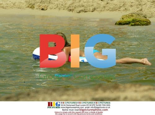 Popl Idol Singer Haley Evetts on Beach in Spain