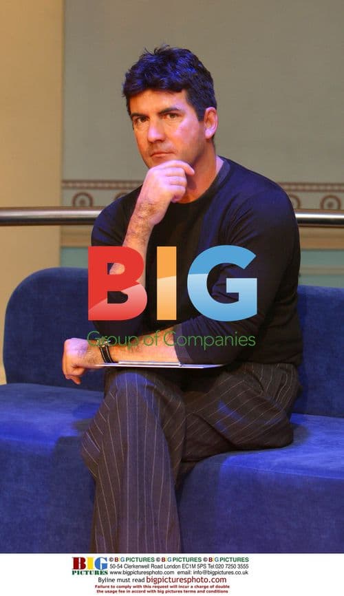 Simon Cowell Wax Figure at Madame Tussauds