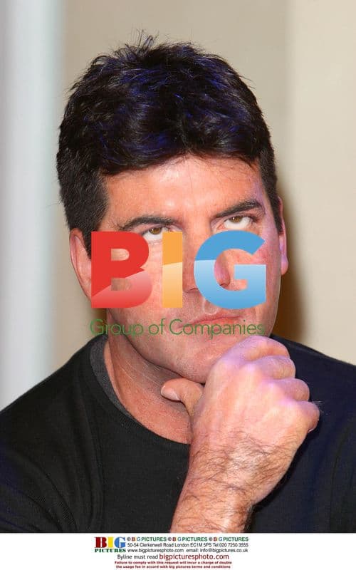 Simon Cowell Wax Figure at Madame Tussauds