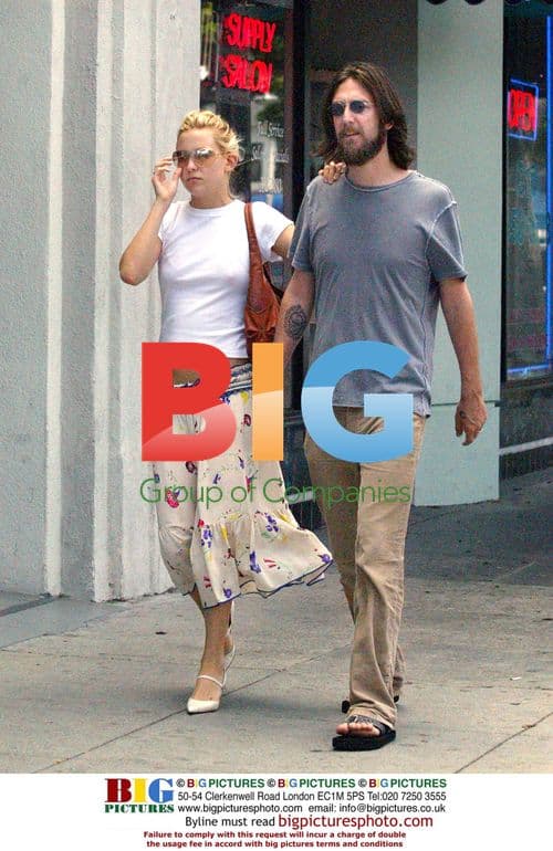 Pregnant Kate Hudson with husband Chris Robertson